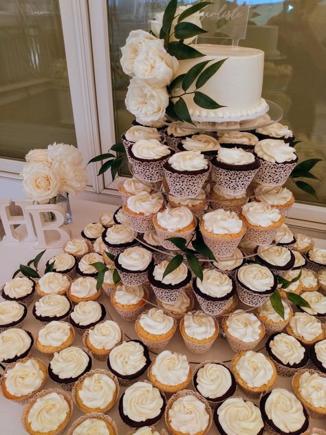 Wedding cupcake tower Greenery Wedding Cake And Cupcakes, Cupcake Tier Wedding, Greenery Wedding Cake, Daisy Wedding Cake, Wedding Cake And Cupcakes, Wedding Cupcake Tower, Cupcake Tier, Cupcake Tower Wedding, Cake And Cupcakes