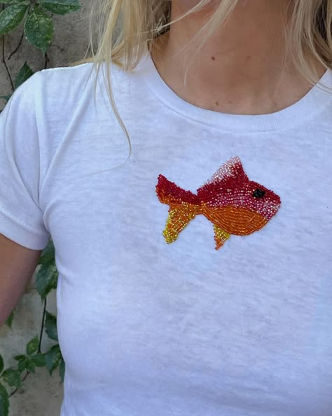 our current summer obsession 🐟🧡 thank you for all the love and orders - we are working hard on getting them to you quickly! 😚💌 Beaded Clothes, Bleach Painting, Small Biz Ideas, Embroidered Top Designs, Beaded Shirt, Fish Shirt, Embroidery Beaded, Pearl Embroidery, Embroidery Tshirt