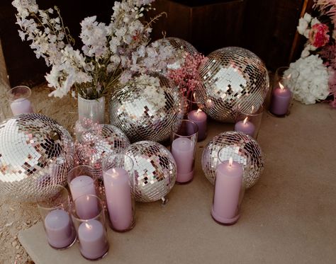 Modern Lilac + Blush Wedding With Disco Balls, Hydrangeas and Iridescent Details | Green Wedding Shoes Disco Ball Party Table Decor, Purple Boho Party, Music Sounds Better With You Wedding, Mirrorball Wedding Decor, Disco Seating Chart Wedding, Disco Balls Wedding Decor, Disco Ball Vase Centerpiece, Disco Ball Tablescape, Disco Ball Decor Wedding