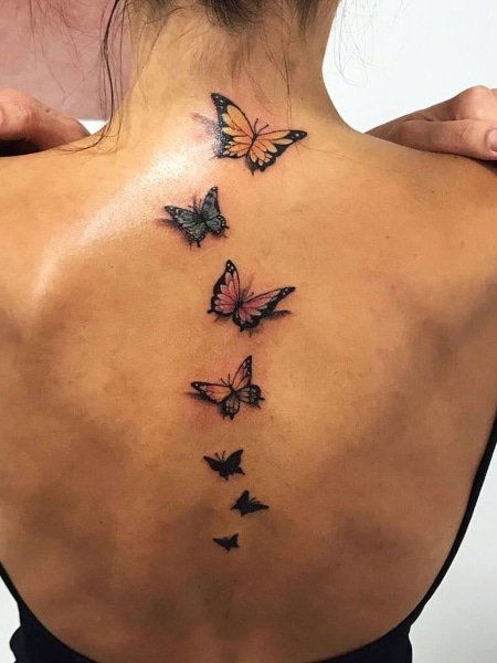 20 Incredible Spine Tattoos Ideas (2021) - The Trend Spotter Tattoo Ideas With Butterflies, Spine Quotes, Tattoo Down Spine, Tatuaje Cover Up, Back Tattoo Women Spine, Spine Tattoo Ideas, Butterfly Back Tattoo, Butterfly Tattoos For Women, Inspiration Tattoos