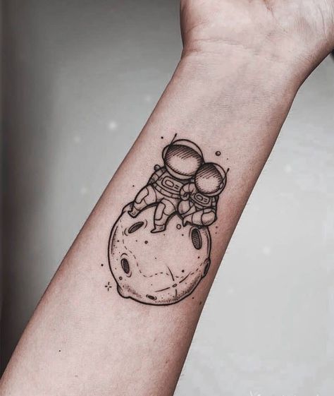 Cute Astronaut Forearm Love Tattoo Matching Love Tattoos, Planet Tattoo, Rocket Tattoo, Astronaut Tattoo, Small Forearm Tattoos, Planet Tattoos, Wrist Tattoos For Guys, Matching Couple Tattoos, Geniale Tattoos