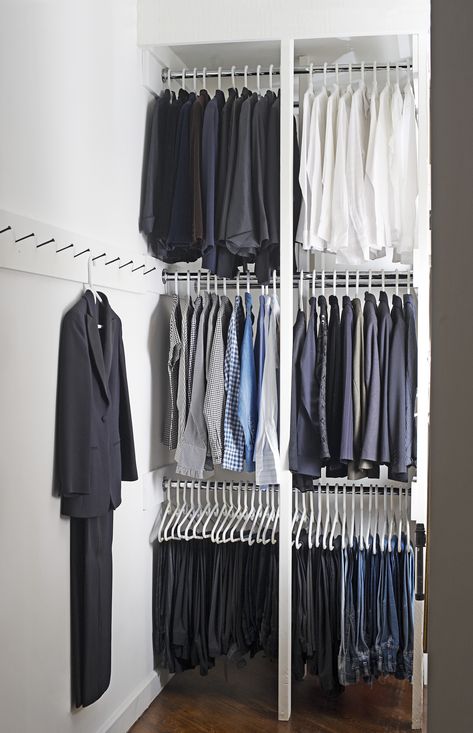 Whatever your closet space, Peri Wolfman advises "potentializing all the storage possibilities" by making use of multiple levels (these racks are two bars deep), placing shelves over doors, and putting hooks on bare walls. Bedroom Storage For Small Rooms, Deep Closet, Master Closet Organization, Smart Closet, Organizar Closet, Organized Closet, Bedroom Closet Storage, Clothes Closet Organization, Clothes Hanging