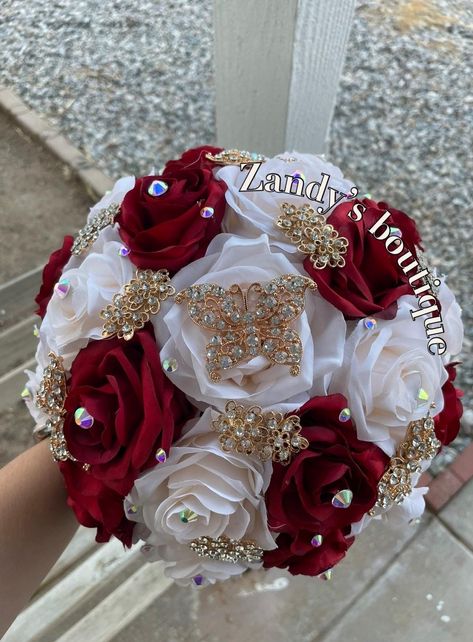 An elegant and beautiful bouquet! Customize bouquets are also available if needed. Different colors and brooches. 10inches in diameter You are welcome to message me and I will reply quick :) Hablo español 😊 Red And Gold Quinceanera Bouquet, Wedding Bouquets Red, Quince Bouquet Red, Quince Bouquet, Bouquet For Quinceanera Red Roses, Red Wedding Bouquet, Ramo Natural Quinceanera Red, Quince Flower Bouquets Red, Quinceanera Flowers