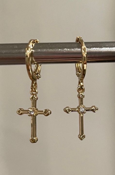 Beautiful dainty cross dangling earrings. 18K gold plated brass.  It is of great importance to me that I make jewelry for my customers that I, myself, wear every day. Each jewelry piece is handmade by me personally with love and care. Each item is crafted to the highest quality and made to exceed the expectations of my customers. My jewelry is designed to you to love and wear no matter what the occasion at an affordable price.  Jewelry is packaged in a velvet pouch and wrapped in tissue paper wh Cross Gold Earrings, Cross Dangle Earrings, Small Cross Earrings, Cross Gold Jewelry, Hrh Collection Jewellery, Gold Cross Jewelry, Cross Earrings Aesthetic, Piercings Idea, Catholic Earrings