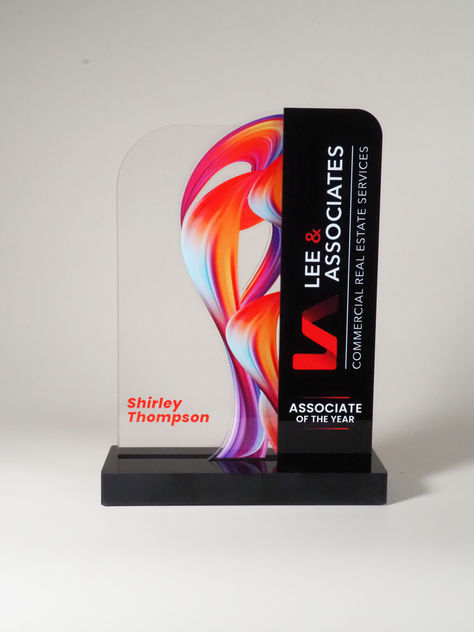 This stunning piece, designed by our talented team member Ray Vibar, showcases a striking blend of clear and black acrylic, illuminated by vibrant color-fused hues. With 15 years of dedication to our company, Ray has crafted an award that embodies both innovation and artistry. Celebrate exceptional achievements with the elegance of the SkyFire Award! Award Design Ideas, Award Plaque Design, Award Trophy Design, Plakat Acrylic, Award Design, Acrylic Trophy, Plaque Design, Glass Awards, Office Interior Design Modern