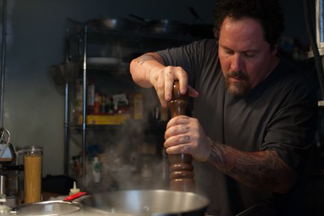 "Chef" movie still, 2014.  Writer/co-producer/director/star Jon Favreau as Carl Casper.  PLOT: A popular Los Angeles chef (Favreau) has a public altercation with a food critic and loses his job.  His ex-wife (Sofia Vergara) invites him to spend time with their child in Miami, where he rediscovers his love for Cuban cuisine and decides to run a food truck with his son. Jon Favreau Chef, Chef Movie, David Stark, Food Film, Cuban Cuisine, Jon Favreau, Los Angeles Restaurants, Food Critic, Ex Wives