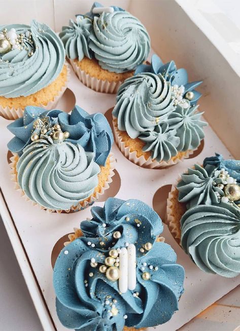 1. Shades of Blue Swirl Cupcakes Sweet and delicious, cupcakes are all the rage nowadays. Nothing is prettier that a cupcake. A small, individual... Blue Cupcakes Decoration, Shades Of Blue Cupcakes, Pastel Blue Cupcakes, Blue Cupcake Ideas, Blue Swirl Cupcakes, Designs For Cupcakes, Elegant Cupcake Designs, Winter Wedding Cupcakes, Wedding Cupcakes Ideas