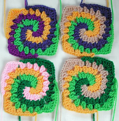 Spiral Granny Squares by joanieponytail57, via Flickr Swirl Granny Square, Crocheted Squares, Sunburst Granny Square, Purse Pattern, Crochet Purse, Blanket Patterns, Granny Squares Pattern, Crochet Square, Crochet Squares