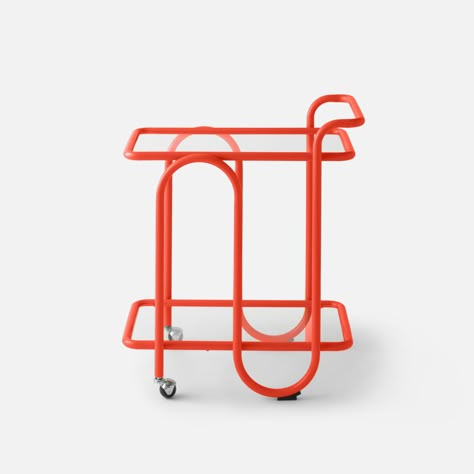 A piece that’s a celebration in its own right. The Lolly Bar Cart is designed to inspire impromptu happy hours and cheerful entertaining anywhere it sits. Swooping bent metal legs keep provisions beautifully contained, while a push handle and caster wheels make it simple to transport. • Bent steel, tempered glass, and ball casters • Maximum weight capacity of 10 pounds per shelf • A Schoolhouse Original Get Finish Samples | Lolly Bar Cart in Lichen-Gloss by Schoolhouse Push Cart Design, Cheap Bar Cart, Small Bar Cart, Unique Bar Cart, Funky Rooms, Mid Century Modern Bar Cart, Lolly Bar, Nyc Decor, No Time To Waste