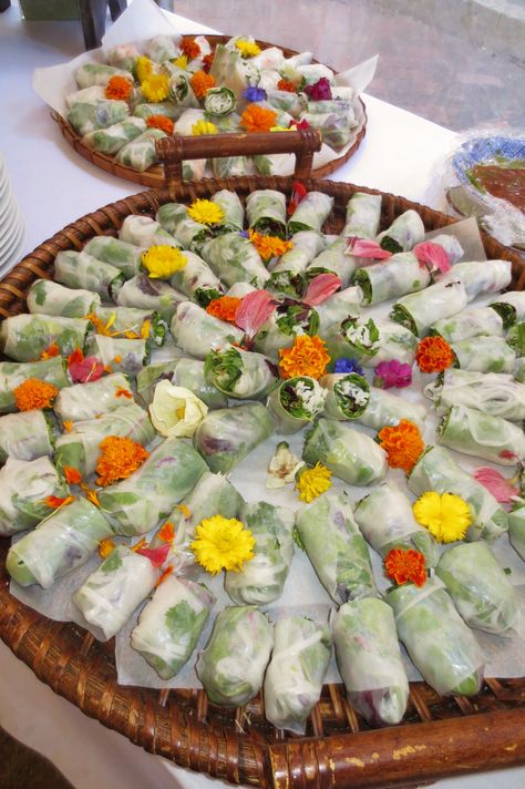 Asian summer rolls with edible flowers from Assaggiare Mendocino Asian Garden Party, Asian Food Wedding Buffet, Spring Roll Charcuterie Board, Asian Grazing Board, Asian Catering Ideas, Asian Themed Charcuterie Board, Asian Grazing Table, Asian Buffet Table Ideas, Thai Wedding Food