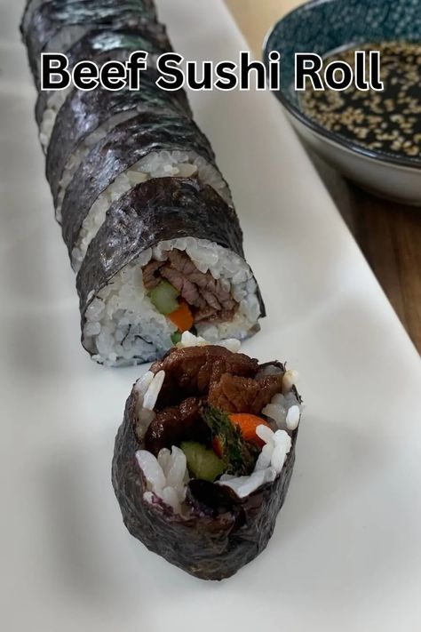 Beef Roll Sushi Recipe | FeedMeBetter Carrots And Asparagus, Beef Sushi, Japanese Barbecue, Sushi Vinegar, Sushi Roll Recipes, Sushi Recipe, Roll Sushi, Beef Roll, Cooked Carrots