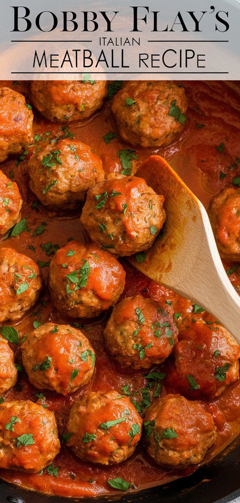 You’ll love Bobby Flay’s Italian Meatballs! Made with a flavorful mix of seasonings and simmered in a rich tomato sauce, they’re perfect over pasta or on their own. Sicilian Meatballs Recipe, Real Italian Meatballs, Bobby Flay Meatballs, Italian Meatball Recipes, Sicilian Meatballs, Cocktail Meatball Recipes, Homemade Italian Meatballs, Bobby Flay Recipes, Italian Pasta Sauce