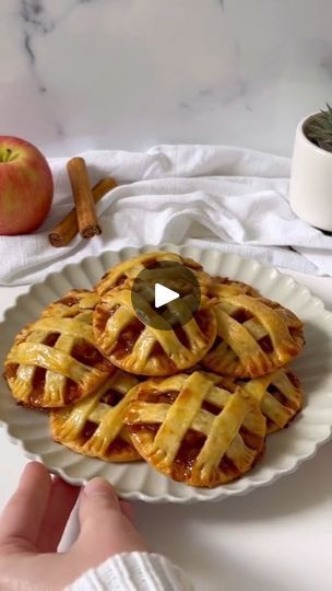 251K views · 170K reactions | Mini Apple Pies Recipe: The Best Bite-Sized Fall Treat 🍏🥧

Ingredients:
- 2 medium apples, peeled and chopped into small cubes
- 3 tablespoons salted butter
- 1/4 cup brown sugar
- 1 to 2 teaspoons of gro cinnamon (to taste)
- 1/4 teaspoon ground nutmeg
- 2 tablespoons lemon juice
- 1/2 teaspoon cornstarch (corn flour)
- 3 teaspoons cold water
- 2 sheets of frozen shortcrust pastry, thawed
- 1 egg, whisked for egg wash

Instructions:
1️⃣ Prepare the Apple Filling:
 In a medium saucepan, melt the salted butter over medium heat. Add the chopped apples, brown sugar, ground cinnamon, ground nutmeg, and lemon juice. Cook the mixture, stirring occasionally, until the apples soften and release their juices (around 5-7 minutes).

2️⃣ Thicken the Filling:
 In a small Mini Apple Pie Recipe, Mini Apple Pies, Fall Cooking, Apple Pies, Corn Flour, Shortcrust Pastry, Mini Apple, Apple Pie Recipes, Ground Nutmeg