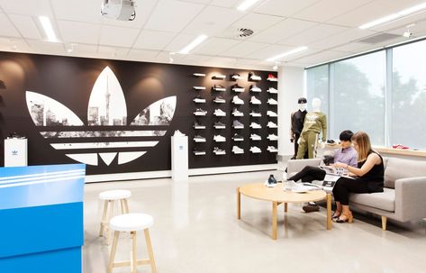 Adidas’ new Auckland head office combines form and function, and celebrates their strong relationship with New Zealand sport. Our creative office design is highly flexible, accommodating a variety of needs, from product displays to fashion shows. Like Adidas’ products, the modern workspace allows the team to perform their best. Personality was infused throughout the space with the trademark thre Creative Office Design, Corporate Office Design, Corporate Office, Strong Relationship, Office Design, Work Space, Portfolio, Adidas, Design