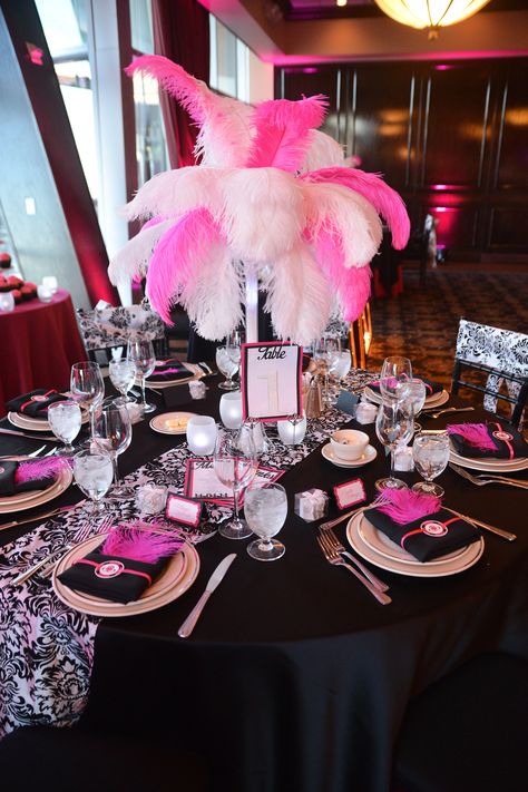 Ostrich feather centrepieces, black and white damask table runners, black and pink vegas theme Pink Vegas Theme Party, Pink Casino Theme Party, Pink Casino, Burlesque Party, Ostrich Feather Centerpieces, Vegas Theme Party, Las Vegas Party, Feather Centerpieces, Vegas Theme