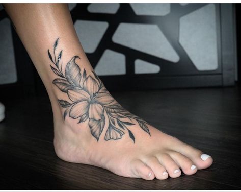 Small Lily Tattoos For Women, Lily Foot Tattoo, Ankle Tattoo Black Women, Hibiscus Spine Tattoo, Foot And Ankle Tattoo, Back Of Ankle Tattoo, Cute Foot Tattoos, Cute Simple Tattoos, Hibiscus Tattoo