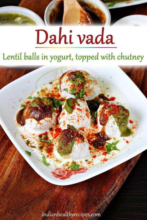 Dahi vada is a popular North Indian snack made with fluffy fried lentil balls, soaked in yogurt & topped with sweet sour & spicy chutney. Learn to make soft fluffy and mel-in-the-mouth dahi vada at home. #indian #snack #dahivada Desi Dishes, Lentil Balls, Dahi Vada Recipe, Spicy Chutney, Dahi Vada, Desi Street Food, Vada Recipe, North Indian Recipes, Indian Dinner