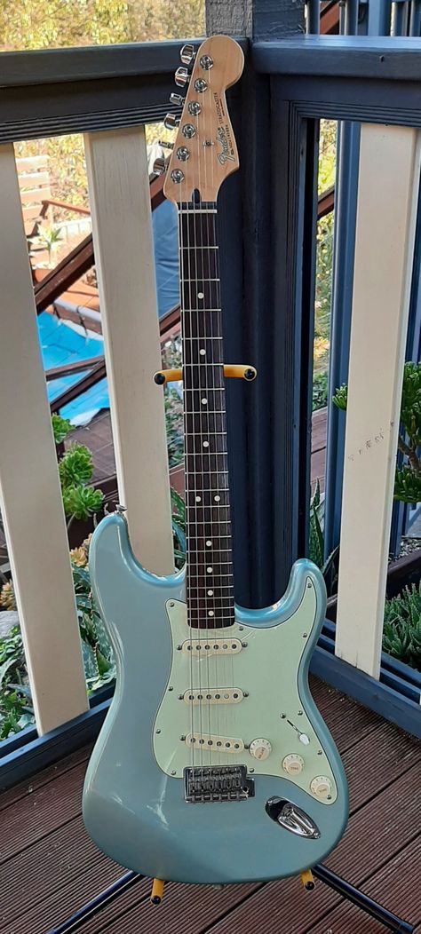 Blue Fender Guitar, Light Blue Electric Guitar Aesthetic, Blue Stratocaster Guitar, Ice Blue Electric Guitar, Light Blue Guitar Aesthetic, Teal Electric Guitar, Fender Guitars Aesthetic, Blue Bass Guitar Aesthetic, Fender Stratocaster Aesthetic