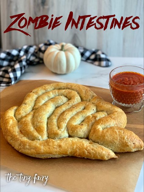 Puff pasty filled with an itslian sausage filling with a side of marinara sauce. Zombie Party Food, Italian Sausage Stuffing, Puff Pastry Dinner, Zombie Snacks, Sausage Puffs, Zombie Food, Halloween Breakfast, Sausage Stuffing, Cheese Puff Pastry