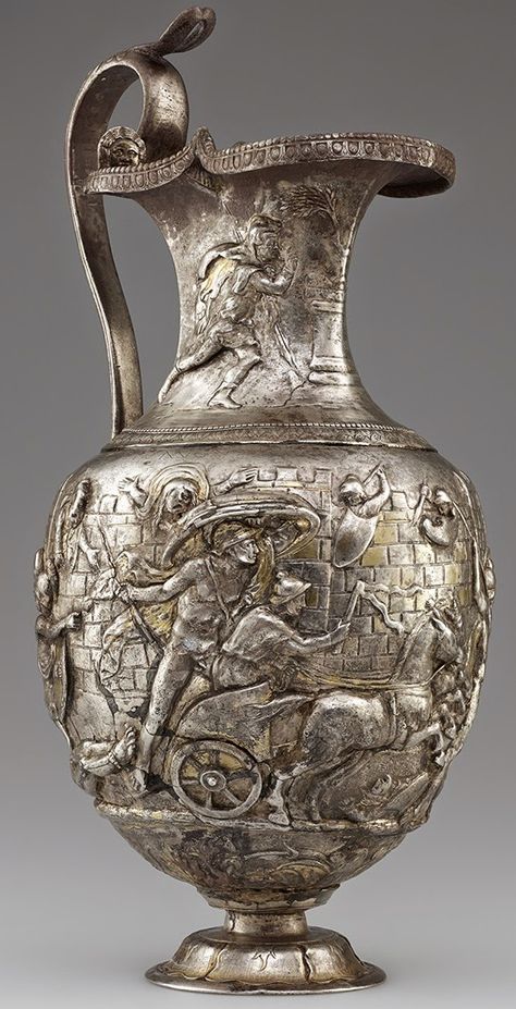 [Artefact] Pitcher with Scenes from the Trojan War, Roman, A.D. 1-100; silver and gold. Achilles dragging the body of Hector around the walls of Troy. [577X1129] Greek Artifacts, Roman Artifacts, Ancient Roman Art, Pompeii And Herculaneum, Greek Warrior, Roman Era, Roman History, Roman Art, Historical Art