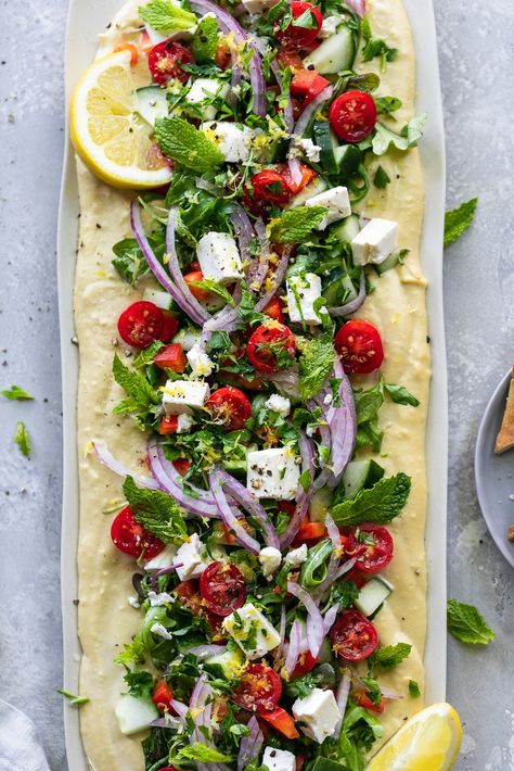 This Greek Salad Hummus Board is an unbelievably flavor-packed appetizer + it's SO easy to make! It starts with a base of the creamiest hummus, and ends with loads of fresh herbs, arugula, cucumber, cherry tomatoes, red onion, red bell pepper, and cubes of feta cheese. It's refreshing, full of texture, and amazingly delicious with some grilled pita! #greeksalad #hummus #appetizer #easy Hummus Board, Loaded Hummus, Salad Hummus, Best Hummus Recipe, Summer Appetizers Easy, Summer Bbq Recipes, Summer Appetizer, Nutritious Diet, Hummus Recipe