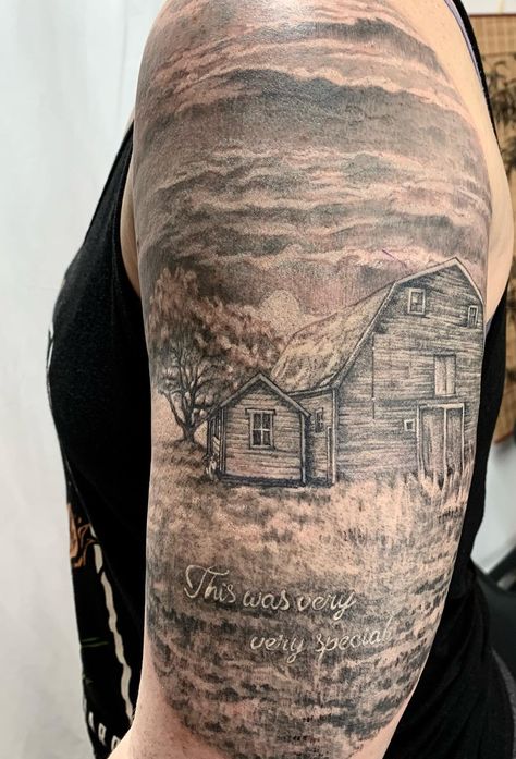 There's no place like home... A realistic black and grey tattoo of her client's childhood home, with beautiful clouds, a tree and the grass, all done by @jenskinart. Tattoo Farm, Bush Landscape, Barn Drawing, Trees House, Bear Tattoo Designs, Hunting Tattoos, Wrist Tattoo Ideas, Cowboy Tattoos, Black And Grey Tattoo