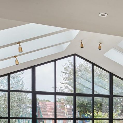 Perla Windows Ltd on Instagram: "Happy New Year! As with last year our primary focus is on more energy efficient steel systems (get in touch if you want more info). This project showcases our Thermally broken steel system being used externally to maximise light and reflect the lines of the pitched roof in our triangular fix. Internally we have our classic steel system with a curved double door. What a stunning kitchen extension!  #perlawindows  #thermallybrokensteeldoors  #thermallybrokensteelwindows  #steeldoors  #energyefficiency  #kitchenextension  #luxurydesign  #londoncontruction  #bespokeglazingsolutions  #builttolast  #lettheoutsidein   Great to work with this wonderful team:  Design @amystoddartstudio  Architecture @mlaarchitecture  📸 @snookphotograph  Windows and doors by us!" Double Pitched Roof Extension, Pitched Roof Kitchen Extension, Pitched Roof Lighting, Kitchen Pitched Roof, Pitched Roof Extension, Duck Egg Blue Kitchen, Pitched Roof Window, Beach Style Decorating, Velux Skylights