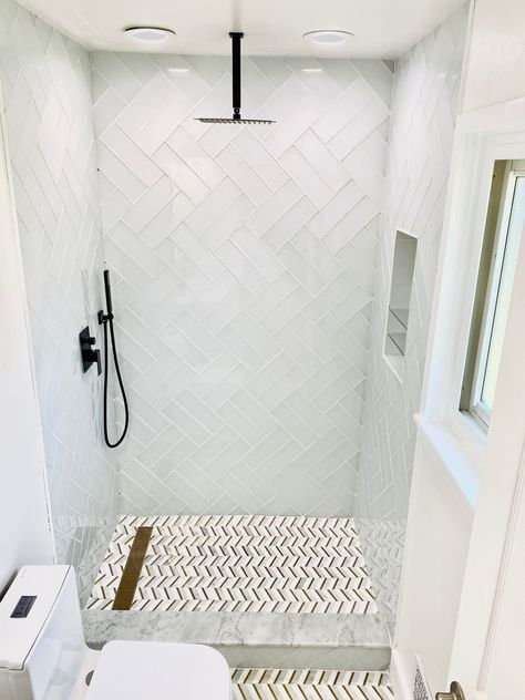 Chevron Subway Tile Bathroom, White Herringbone Shower Tile Floor, White Herringbone Tile Black Grout, Large Subway Tile Shower White Herringbone, Subway Tile Bathroom Floor, White Herringbone Shower Floor, White Herringbone Shower Tile, White Herringbone Shower, Double Herringbone Tile