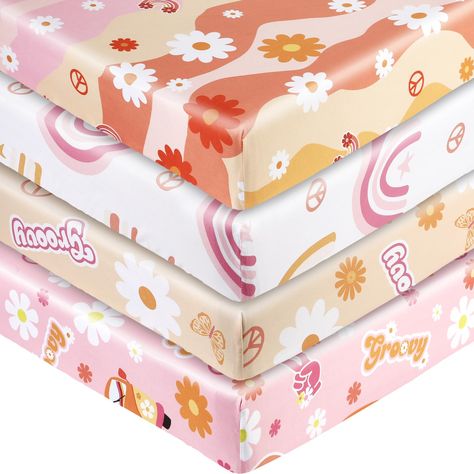 PRICES MAY VARY. 【4 Pack Fun Crib Sheets Sets】The Groovy Party Hippie crib sheets set included 4 sweet floral motifs in shades of orange & pink look vibrant on a crisp white background. You will have enough cribs sheets to replaces once one even two or three during washing, perfect for any nursery and save your money and time. 【Perfect Size】The Groovy themed crib sheets fit most standard crib mattress. The Groovy Hippie Boho Daisy crib sheets come with a universal design, with full elastic trim Baby Changing Pad Cover, Girl Nursery Themes, Hippie Party, Baby Changing Pad, Boho Girl, Baby Changing, Crib Mattress, Changing Pad Cover, Changing Pad