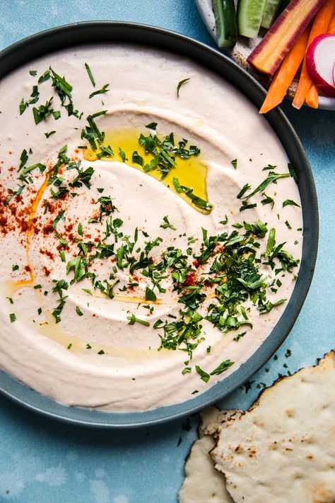 Creamy and full of nutrition, our zesty, garlicky white bean hummus recipe is a delicious, easy spin on classic hummus. Vegan Hummus Recipe, White Bean Hummus Recipe, Bean Hummus Recipe, White Bean Dip Recipe, Best Picnic Food, Picnic Food Ideas, Classic Hummus, White Bean Hummus, Bean Hummus