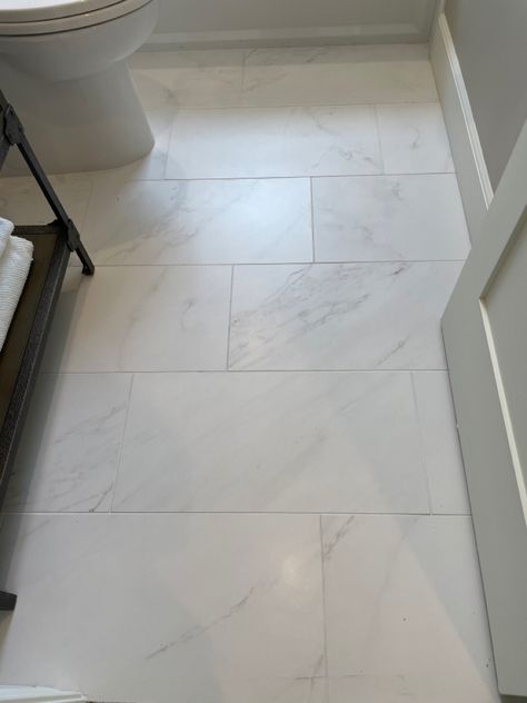 Simple Tiles Design For Floor, Simple White Bathroom Floor Tile, Groutless Bathroom Floor, White Bathroom Tiles Floor, Light Bathroom Floor Tile, Tile Over Tile Bathroom, Big Tile Bathroom, White Marble Bathroom Floor, Classic Bathroom Floor Tile