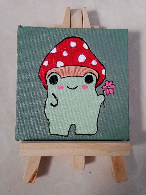 mushroom frog holding a flower 🌸 Frog Holding A Flower, Frog Painting Easy, Cute Froggy, Mushroom Painting, Mushroom Frog, Holding A Flower, Mushroom Paint, Simple Canvas Paintings, Easy Canvas Painting