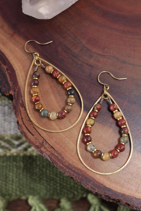 Nested hoops of brass and gemstones for a pretty, lightweight statement. // size // - earrings measure 2.5 inches long