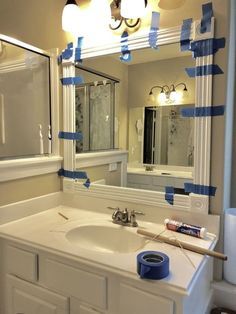 Frames For Bathroom Mirror, Frame Your Bathroom Mirror, Frame A Wall Mirror, Framing A Builder Grade Mirror, Frames For Mirrors Bathroom, Diy Frame For Wall Mirror, Mirror Upgrade Diy Frames, Frames Around Bathroom Mirrors, Tile Sticker Mirror Frame