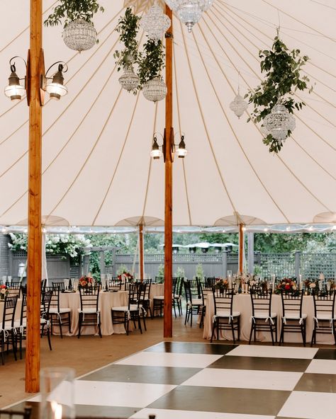 All the fun details came together perfectly for Samantha and Nick’s Tented Wedding at Willowdale Estate! A chance of rain could not put a damper on the reception tent decorated with a black and white dancefloor, chandeliers, greenery, and bright florals. The night ended with a sweet chocolate fountain and a packed dancefloor! WEDDING PROS: Photography: @genevievephotographyy Wedding Planner: @katydydevents Venue & Catering: @willowdaleestate Lighting: @socialightboston Videography: @yours... Chandelier Tent Wedding, Black And White Tent Wedding, Tent With Chandelier, Wedding Tent Lighting, White Tent Wedding, Willowdale Estate, Reception Tent, Tent Wedding Reception, Tent Decor