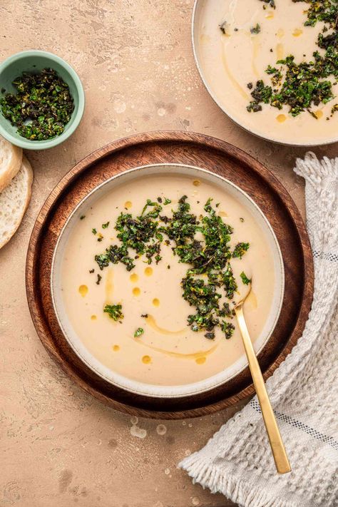 This vegan soup is creamy and satisfying without one bit of dairy. Garnishing it with a bright, fresh Italian herb condiment makes it extra special. Soup With Sage, Sage Soup, Creamy White Bean Soup, Bean Soups, Dishing Out Health, Gremolata Recipe, Dairy Free Soup, Canned Beans, White Bean Soup