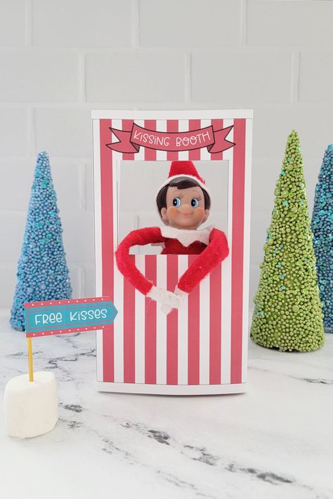 This Elf On The Shelf kissing booth may just be one of our new favorite elf ideas! Super cute and easy to make, the kids are going to love this adorable free printable! Elf On The Shelf Kissing Booth Printable, Elf Kissing Booth Free Printable, Elf On The Shelf Kisses Ideas, Elf On The Shelf Kissing Booth, Elf Kissing Booth, Elf Printables Free, Christmas Elf Ideas, Elf Kisses, Elf Printables