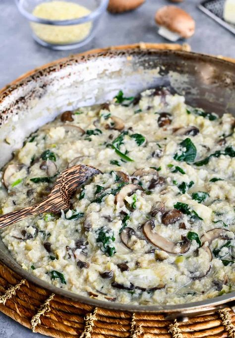 This Mushroom Risotto with Cauliflower Rice has a rich creamy sauce and an umami mushroom taste that's as warm and comforting as traditional risotto. It's just as easy to make but it's grain free and full of nutrient rich vegetables.  A paleo, gluten free recipe with a vegan option and Whole30 compliant. Cauliflower Rice With Mushrooms, Creamed Vegetables, Traditional Risotto, Creamy Mushroom Risotto, Cauliflower Rice Risotto, Cauliflower Risotto, Gluten Free Recipe, Mushroom Risotto, Risotto Recipes