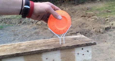 Don't spend money on a store-bought one when you can make your own DIY clay target holder. Diy Target Stand, Diy Targets For Shooting, Target Stands For Shooting Diy, Slingshot Target, Archery Target Stand, Shooting Bench Plans, Outdoor Shooting Range, Shooting Table, Hunting Stuff