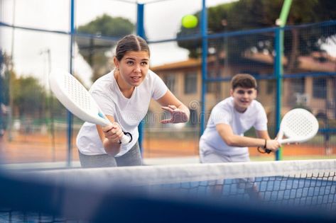 Young sporty couple playing paddle tennis outdoors stock photo Paddle Tennis, Tennis Match, Stock Photography Free, Photo Image, Tennis, Royalty Free, Stock Images, Stock Photos