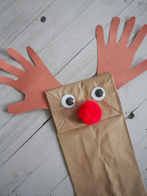 Christmas Paper Bag Puppets  Reindeer craft, Reindeer puppet, rudolph craft, handprint reindeer crafts #santabrucebook Reindeer Puppet, Handprint Reindeer, Easy Craft Ideas For Kids, Rudolph Crafts, Reindeer Crafts, Diy Reindeer, Diy Elf, Craft Handprint, Diy Schneemann