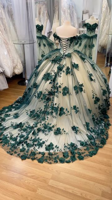 Quinceanera Dresses With Cape And Hood, Quince Dresses With Capes, Quince Dress Sleeves, White And Green Quinceanera Dresses, 15 Dresses Quinceanera Green, Olive Green Quinceanera Dresses, Quinceanera Dresses With Sleeves, Emerald Quinceanera Dress, Dark Green Quinceanera Dresses