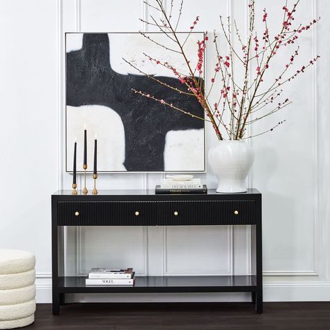 Absolutely love the combination of satin black finish and brushed gold handles. 😍✨ #indoor #indoorfurniture #furniture #consoletable #table #livingroom Adele Home, Fluted Drawers, Gold Sphere, Interior Design News, Black Console Table, Monochromatic Palette, Painting Medium, Oval Table Dining, Bookcase Shelves