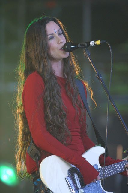 Alanis Morissette. Alanis Morissette, Long Hair, Singing, Guitar, Concert, Hair