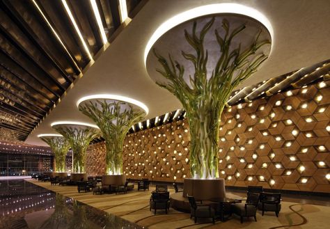 Hand Blown glass branches wrap large soffit columns to create whimsical sycamore tree designs leading the eye upwards Column Cladding, Column Lighting, Interior Columns, Pillar Design, Column Design, Traditional Houses, Hotel Interior Design, Lobby Design, False Ceiling Design