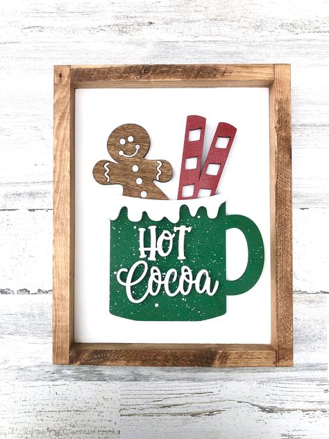 The cutest cup of hot cocoa there is! What an adorable little gingerbread man, nestled into his cup of hot cocoa, with his shimmery whipped cream and sparkly peppermint sticks beside him! This sweet sign measures in at 10.5 inches wide by 13 inches tall. Each sign is made to order and due to the nature of the painting technique used to make the sign (the speckles on the cup), will vary from the photo shown. Christmas Coffee Bar Signs, Bar Signs Diy, Hot Cocoa Station, Blackboard Sign, Cocoa Station, Hot Cocoa Bar Sign, Diy Hot Cocoa, Cat Outline, Fav Products