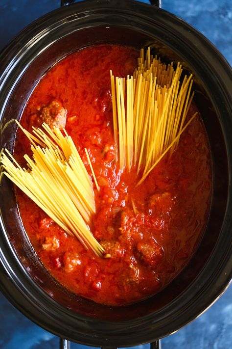 Slow Cooker Spaghetti and Meatballs - This is the ONLY way to make this! Even the pasta gets cooked right in the crockpot! SO stinking easy, right? Pasta In The Slow Cooker, Spaghetti In Slow Cooker, Spaghetti In A Crockpot, Spaghetti In Crockpot Slow Cooker, How To Cook Pasta In A Crockpot, Slow Cooker For Two, Cooking Pasta In Crockpot, Crockpot Spaghetti Recipes, Spaghetti Crockpot Recipes