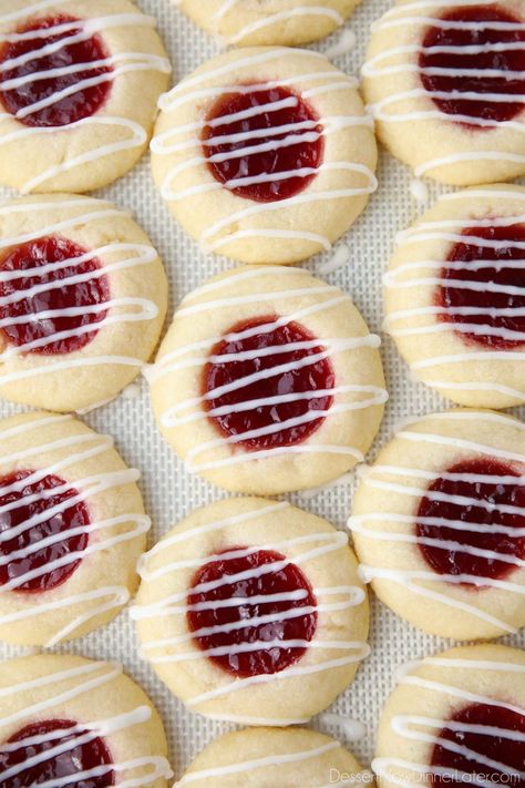 Raspberry Thumbprint Cookies Raspberry Cookie Recipes, Raspberry Thumbprint, Raspberry Thumbprint Cookies, Almond Glaze, Jam Thumbprint Cookies, Almond Shortbread Cookies, Thumbprint Cookies Recipe, Raspberry Cookies, Raspberry Almond