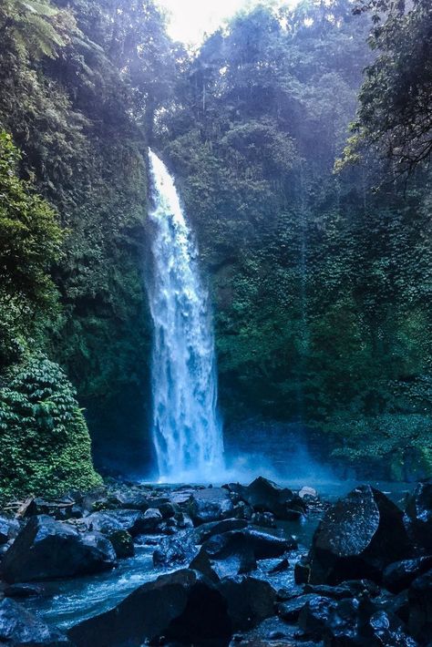 If you want to explore Bali waterfalls, why not go on a Bali waterfall adventure? Discover one of the best waterfalls in Bali including Nungnung Waterfall. Gouache Ideas, Waterfall Bali, Bali Waterfalls, Travel International, Chasing Waterfalls, Scenery Photos, Waterfall Adventure, Waterfall Photography, Nature Sounds