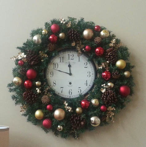 "My son thought a wreath around the clock would look nice. He couldn't find one that fit right so I made him one out of two wire hangers, some garland and contact hooks. He told me it looks awesome :-)" Christmas Clock Decoration, Clock Ornaments, Clock Theme Party Decoration, Clock Christmas Decoration, Christmas Wreath Incorporating A Musical Instrument, Clock Cogs Mirror, Christmas Clock, Wire Hangers, Christmas Tree Themes